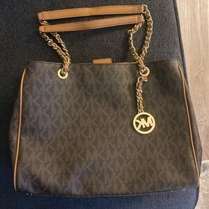 Brown leather Michael Kors logo tote.